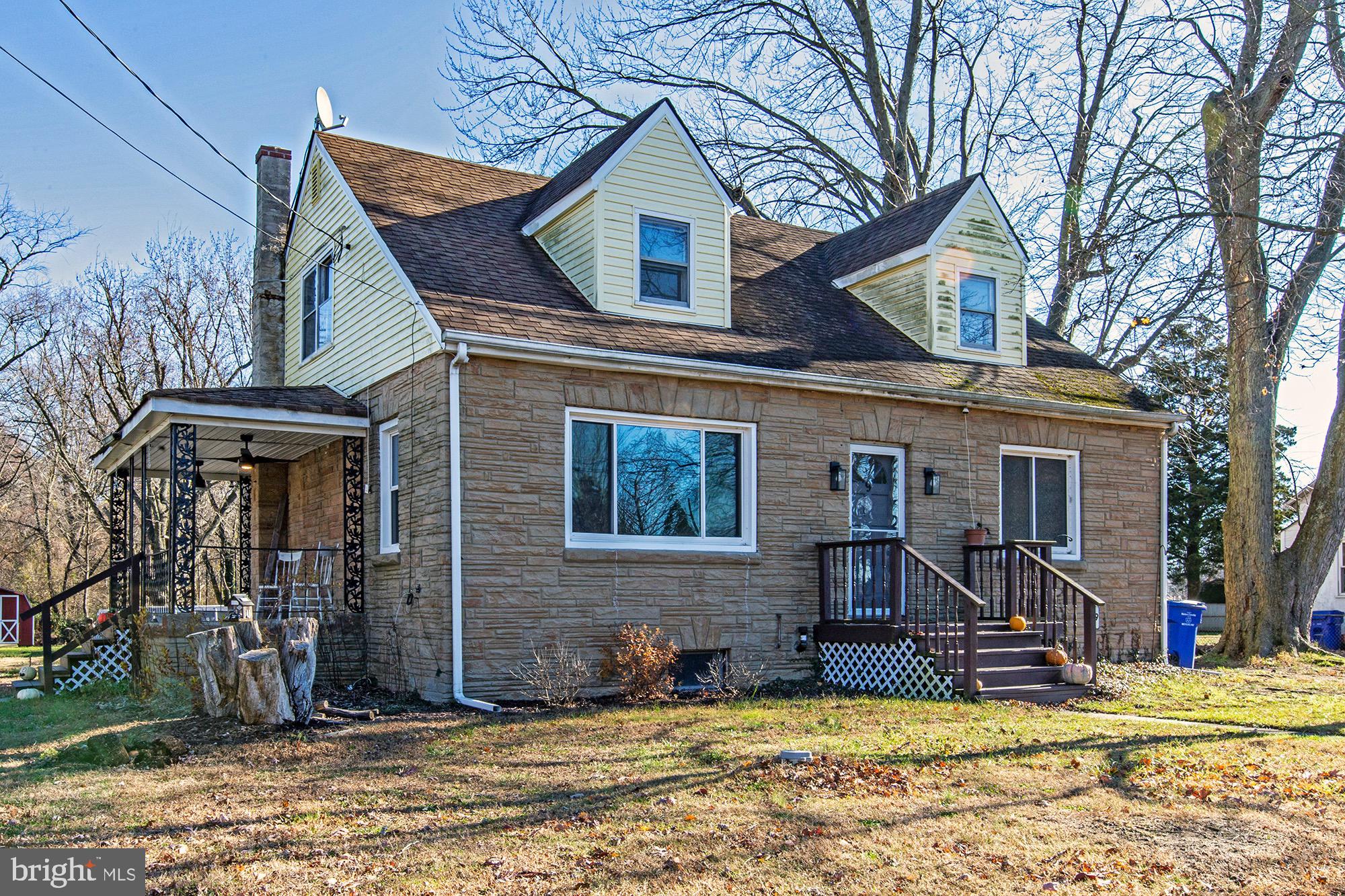 a view of a house with snow on the roof