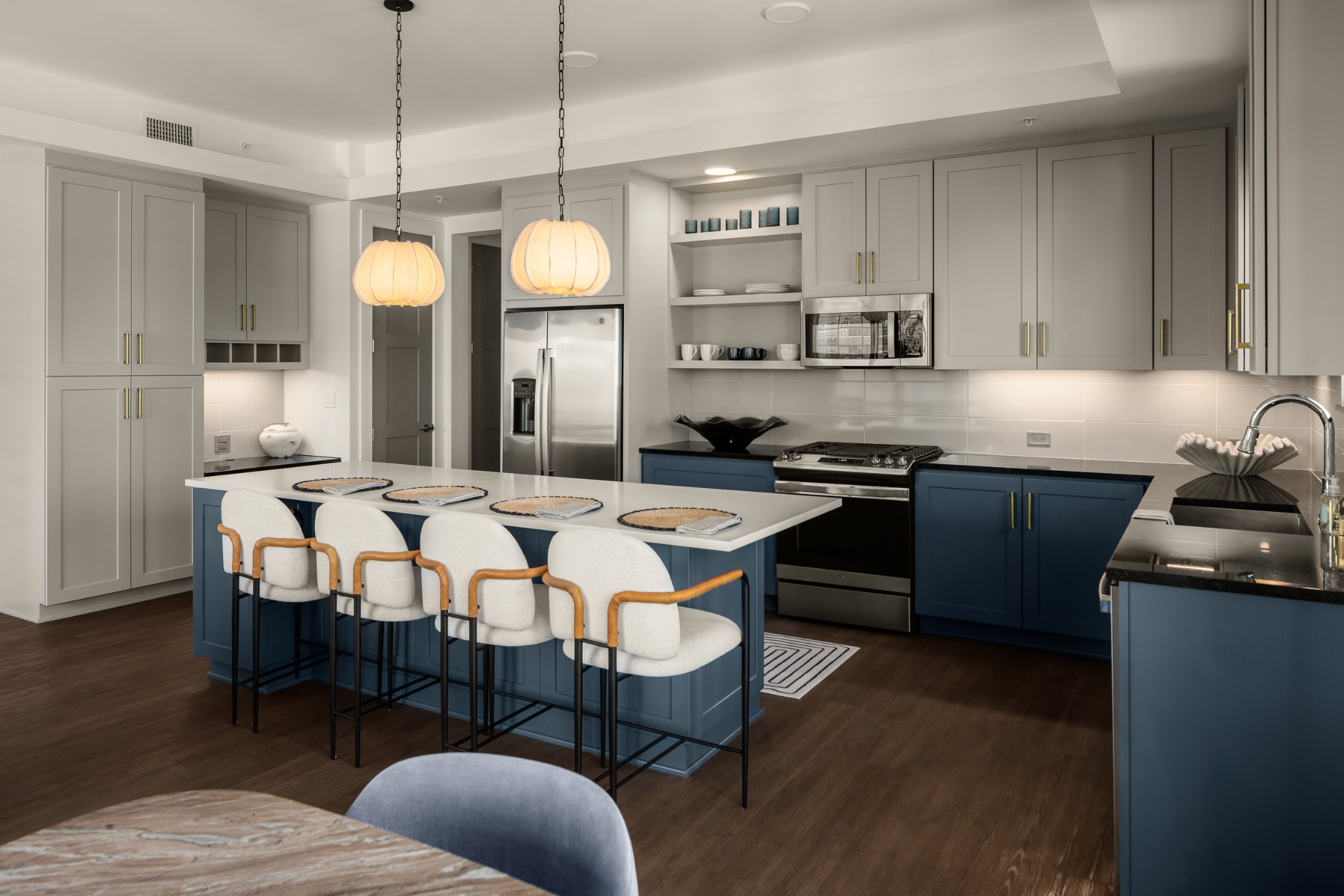 930 Commerce Street, Unit 12 Nashville, TN 37203 - Photo 17 of 57 a large kitchen with a table and chairs