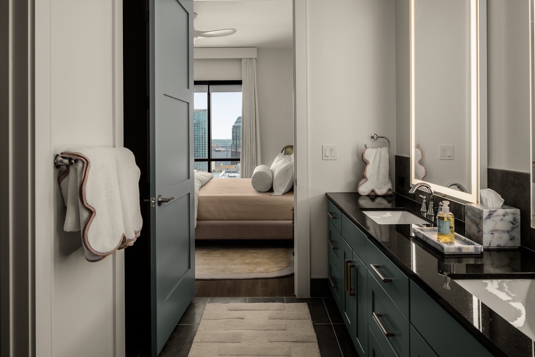 930 Commerce Street, Unit 12 Nashville, TN 37203 - Photo 25 of 57 a bedroom with a bed and a window