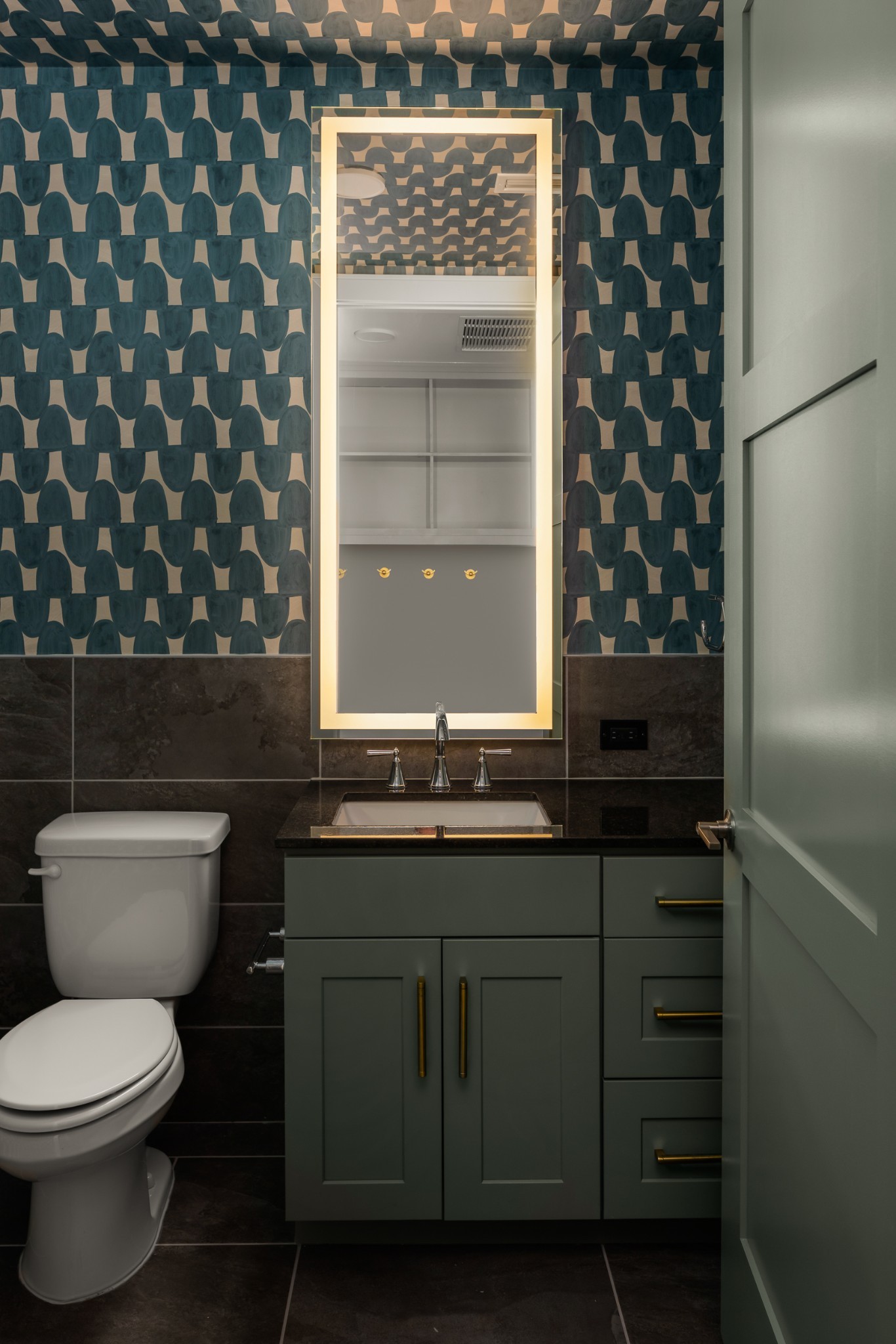 930 Commerce Street, Unit 12 Nashville, TN 37203 - Photo 4 of 57 a bathroom with a toilet a sink and a window