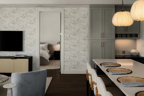 a bedroom with a bed and a fireplace