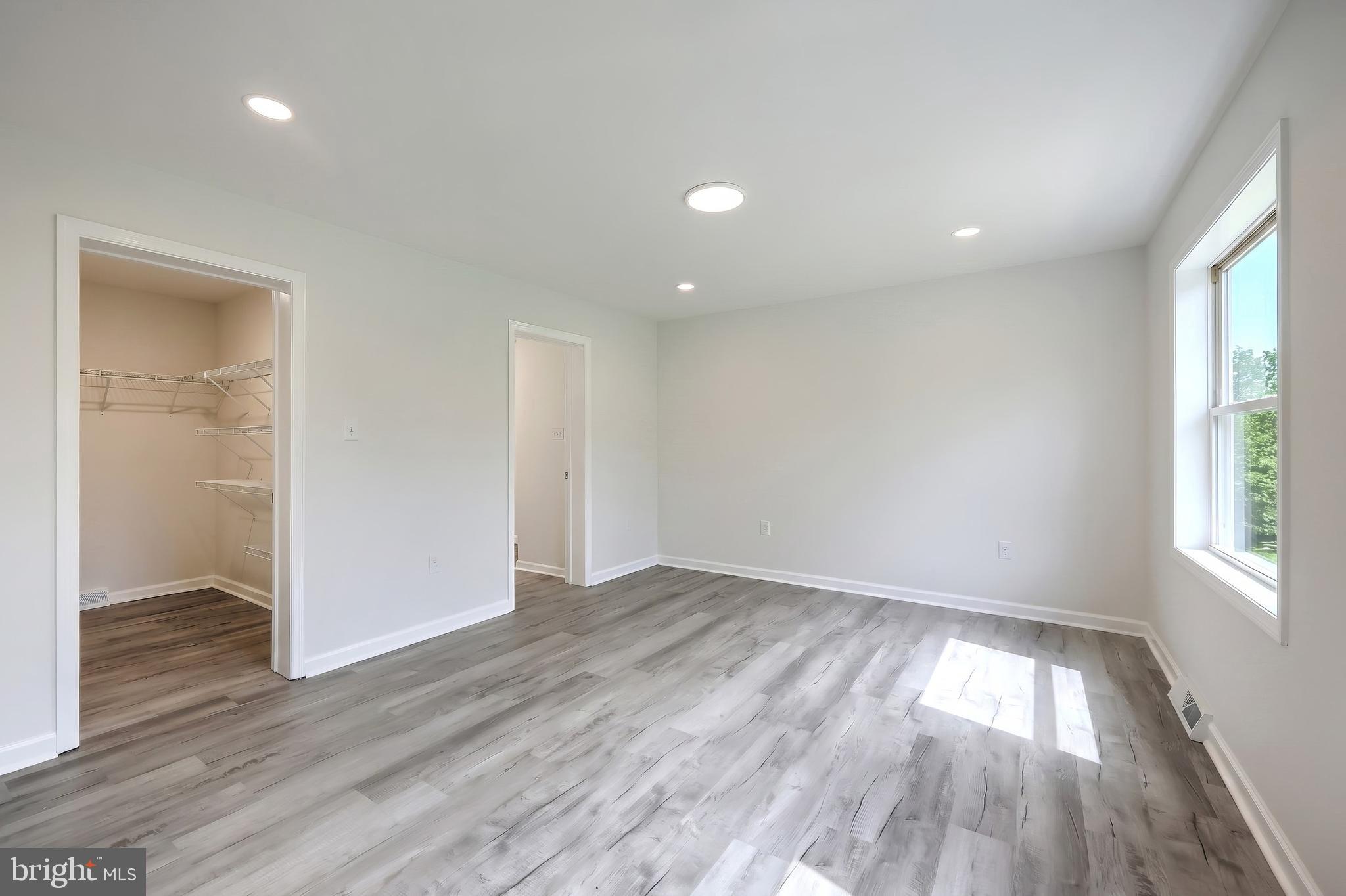 12588 Lebanon Church Road Felton, PA 17322 - Photo 11 of 58 Primary bedroom features walk-in closet & en suite