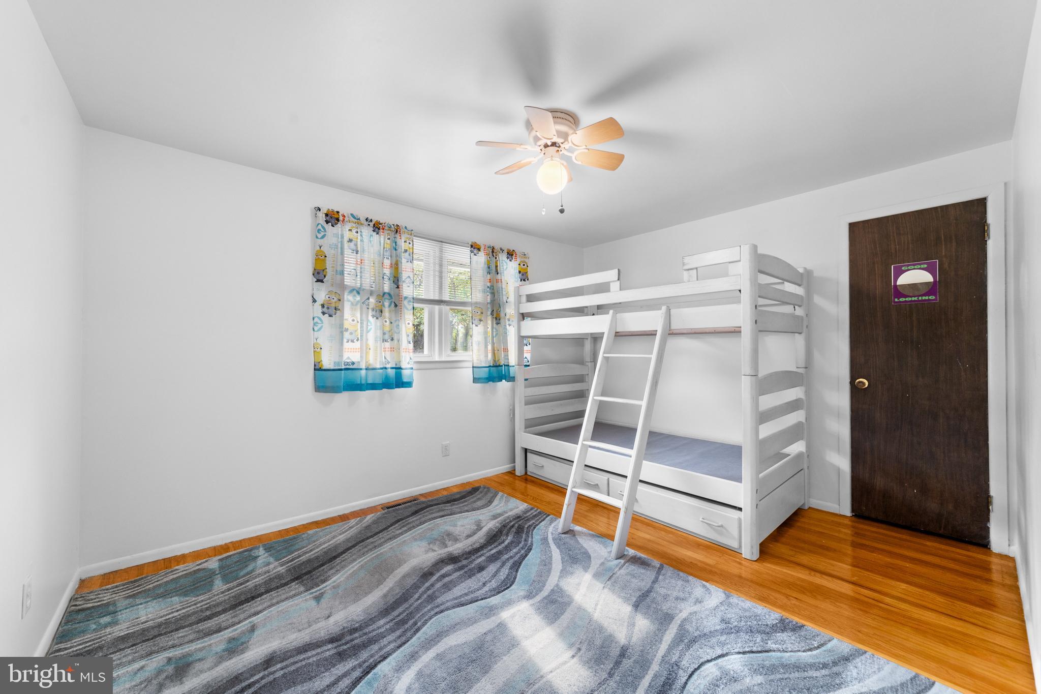 1606 Gordon Road Burlington, NJ 08016 - Photo 27 of 35 a view of a bedroom with wooden floor and cabinet