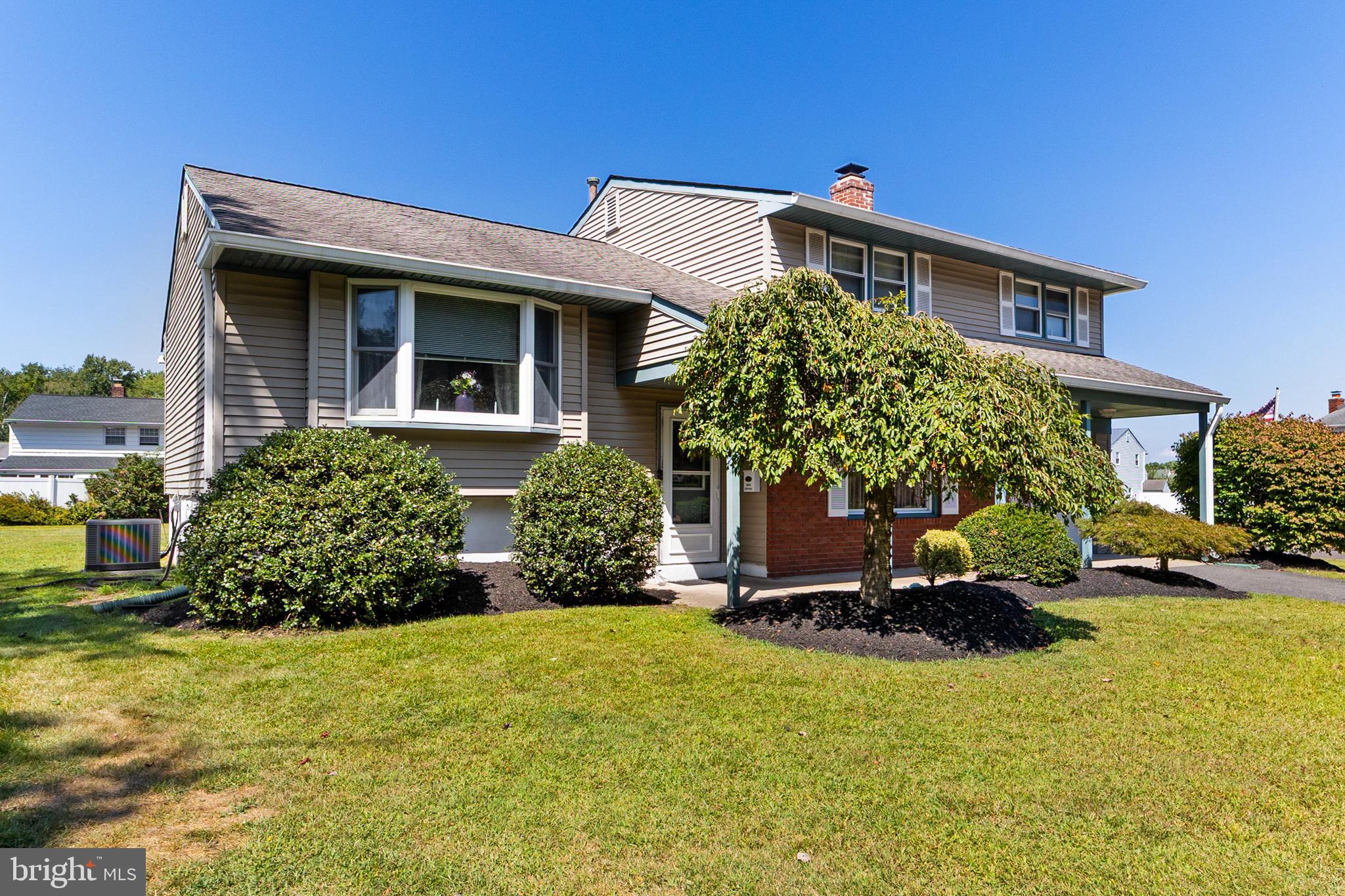 1606 Gordon Road Burlington, NJ 08016 - Photo 4 of 35 a front view of a house with a yard