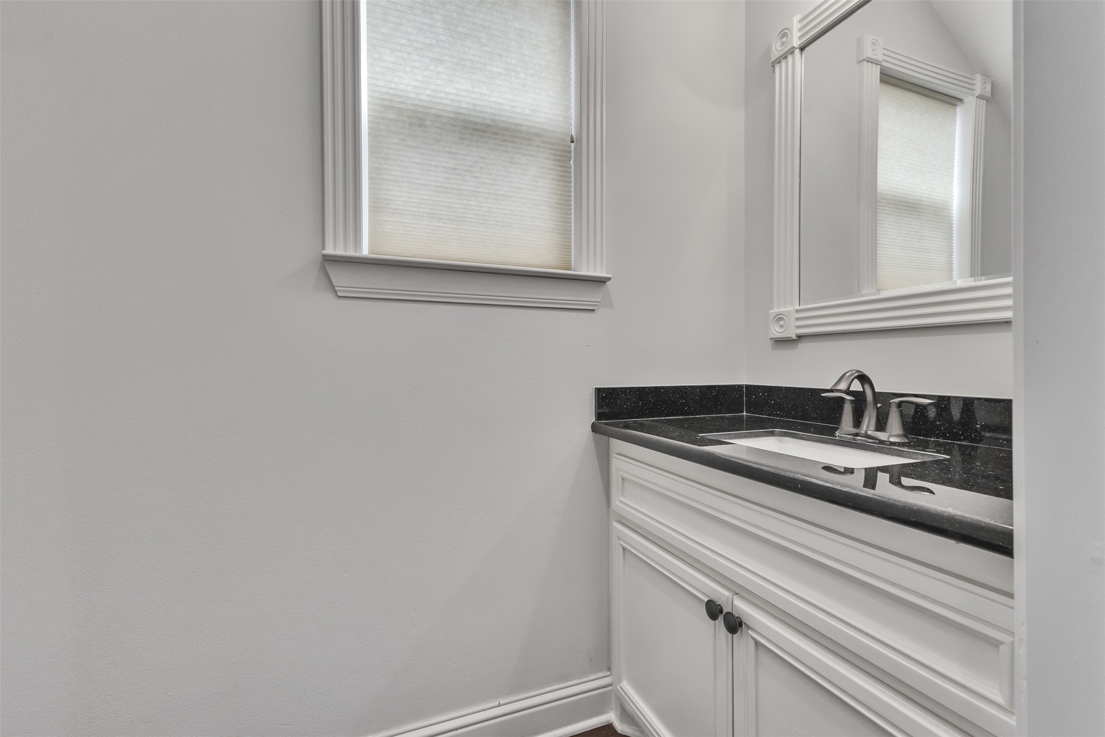 3911 Kennon Street, Unit A Houston, TX 77009 - Photo 6 of 14 a view of a sink and mirror