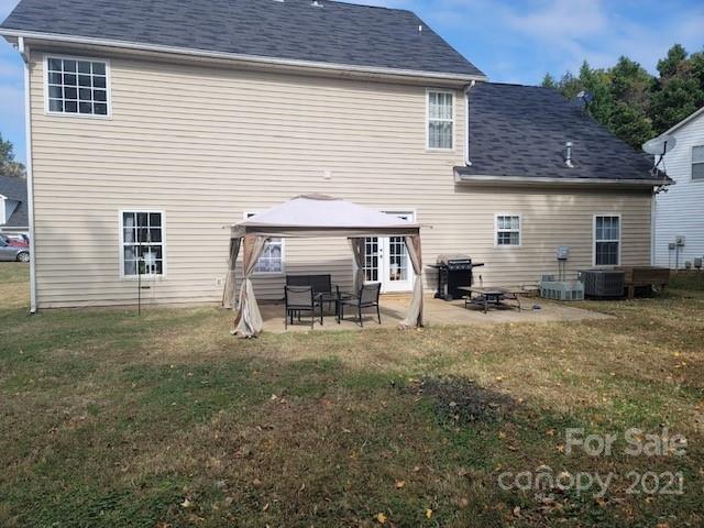 11402 Woodfire Road Charlotte, NC 28269 - Photo 24 of 24 a view of a house with backyard and sitting area