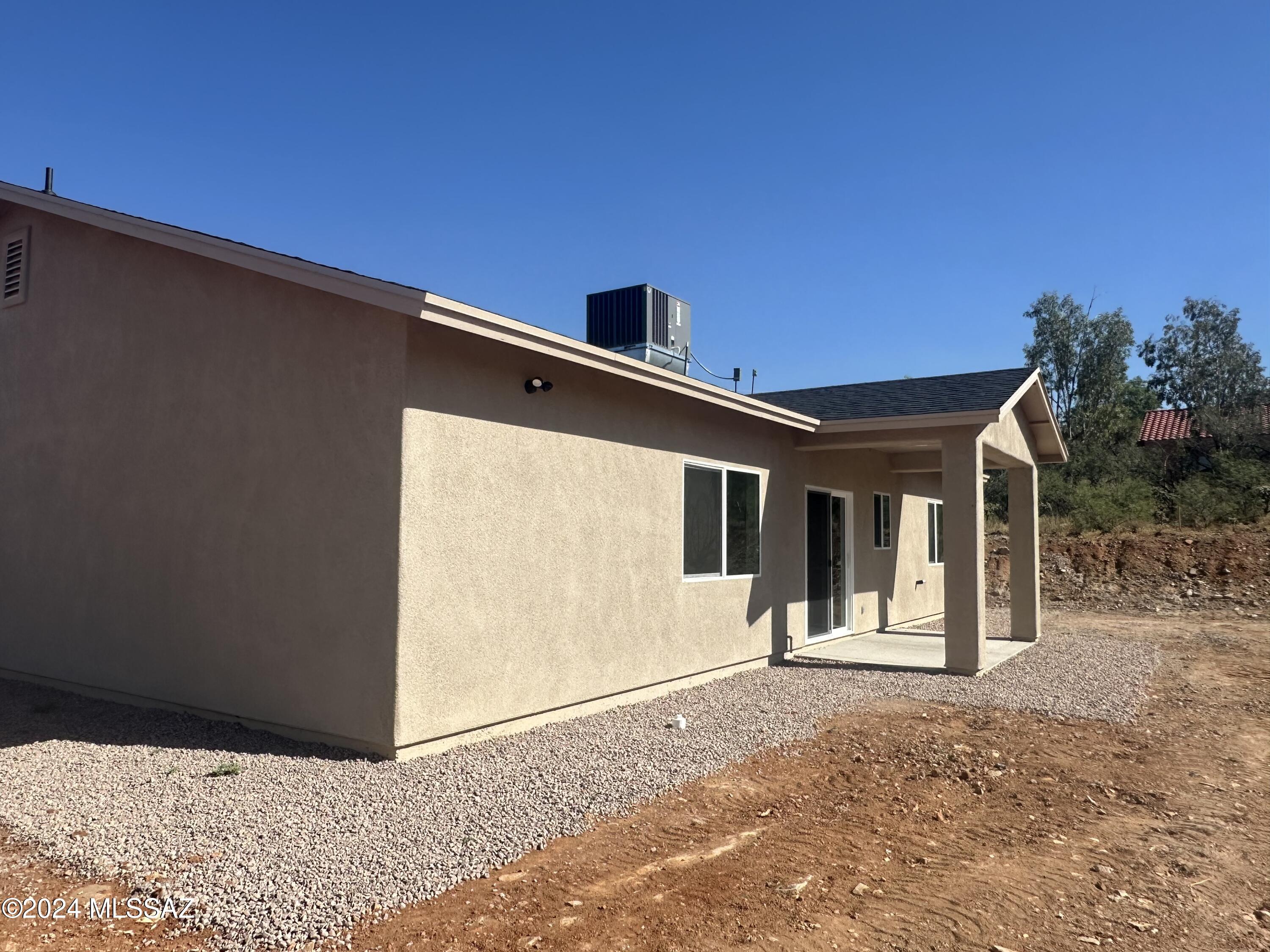 169 Camino Mar Rio Rico, AZ 85648 - Photo 39 of 40 a front view of a house with a yard