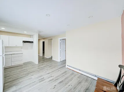 a bathroom with a sink a toilet and a bathtub