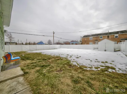 a view of a road with an ocean view