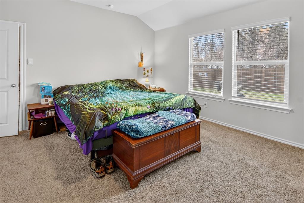 536 Bronze Circle East Springtown, TX 76082 - Photo 15 of 28 a bedroom with a bed and a window