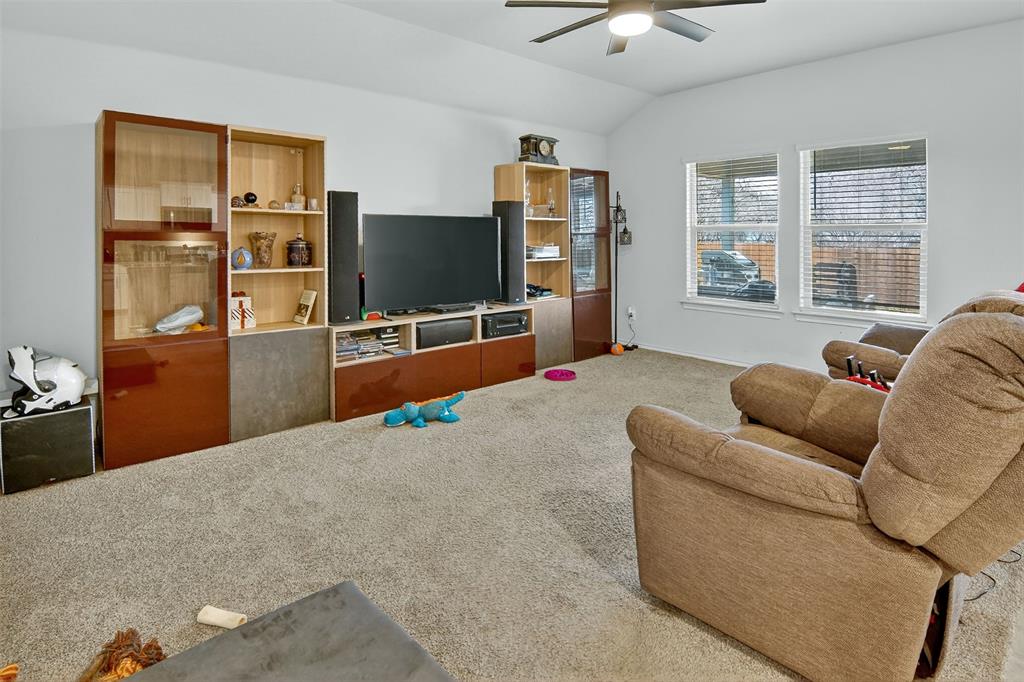 536 Bronze Circle East Springtown, TX 76082 - Photo 7 of 28 a living room with furniture and a flat screen tv