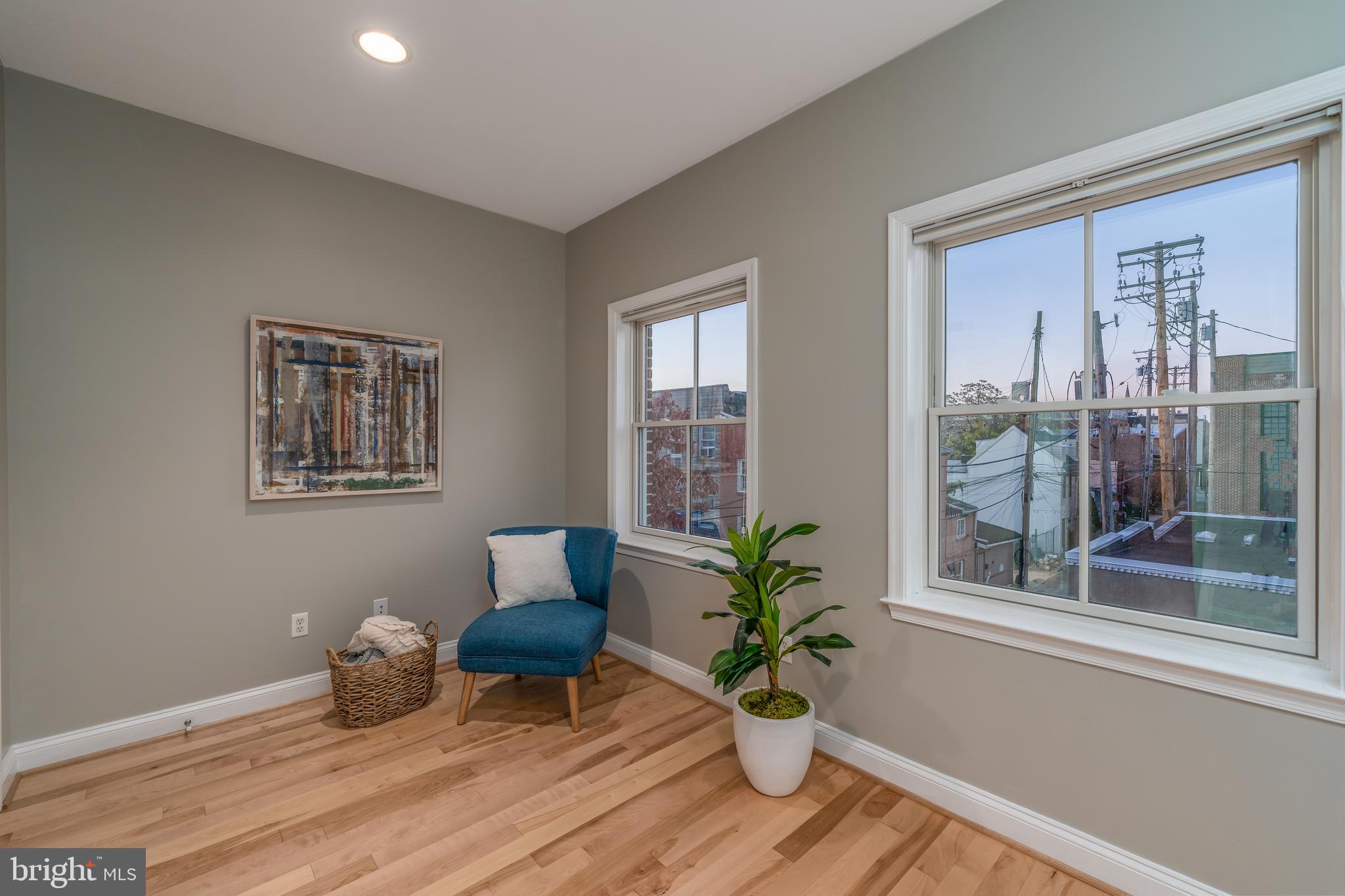 1715 Lancaster Street Baltimore, MD 21231 - Photo 24 of 68 a living room with furniture and wooden floor