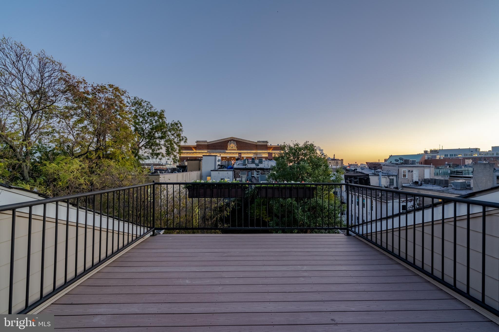 1715 Lancaster Street Baltimore, MD 21231 - Photo 30 of 68 a view of a balcony with wooden floor and city view