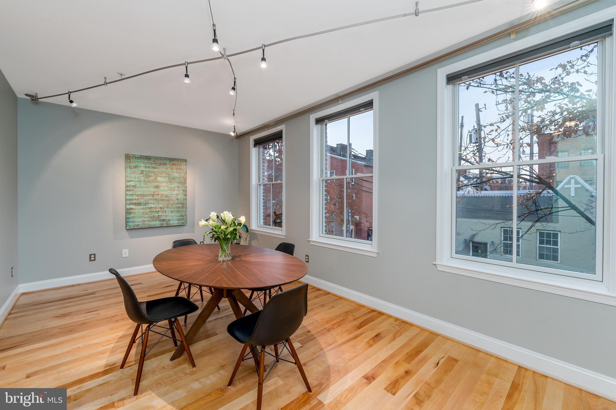 1715 Lancaster Street Baltimore, MD 21231 - Photo 10 of 68 a dining room with furniture and window