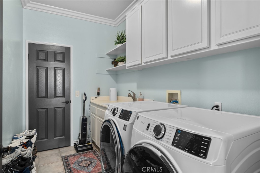 14178 Montclair Court Rancho Cucamonga, CA 91739 - Photo 17 of 45 Laundry room with extra storage downstairs
