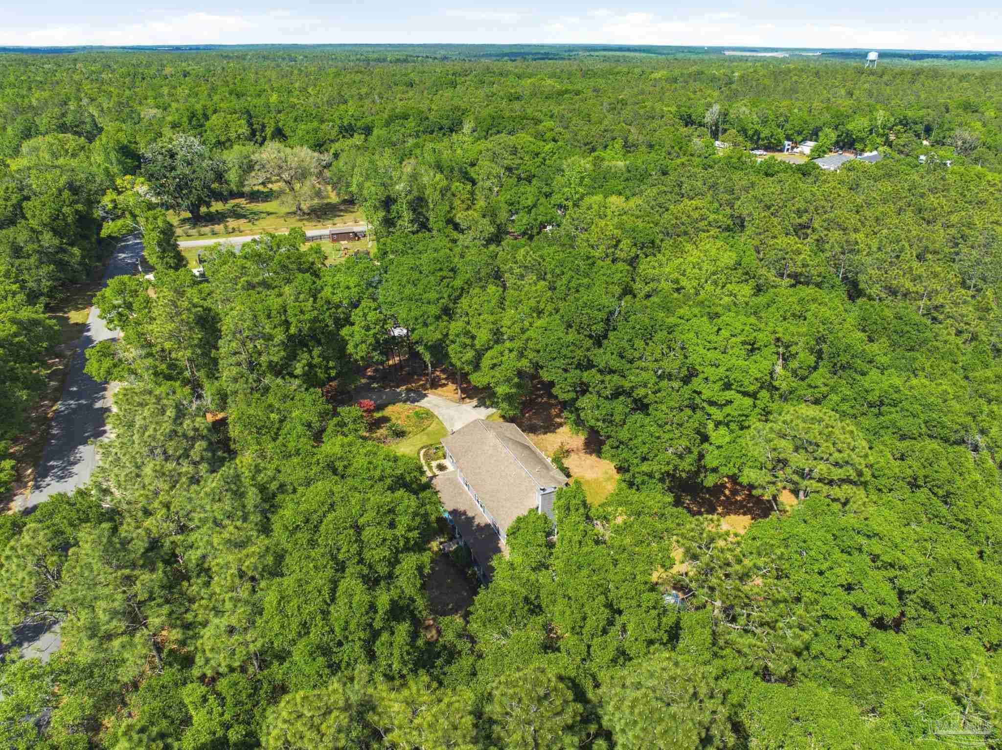 6930 Summit Way Milton, FL 32570 - Photo 55 of 71 a view of a lush green space with sea