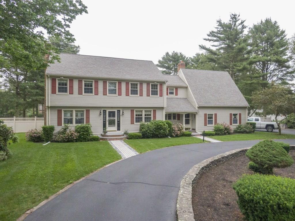 344 Walnut Plain Road Rochester, MA 02770 - Photo 1 of 42 a front view of a house with a yard and garage