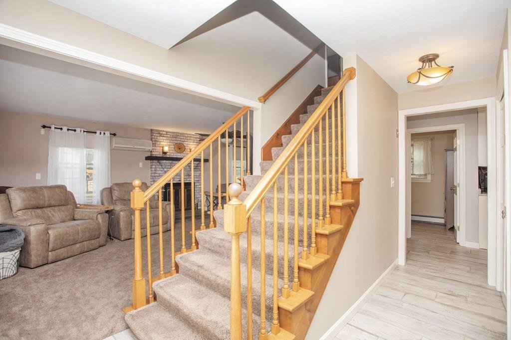 344 Walnut Plain Road Rochester, MA 02770 - Photo 14 of 42 a view of entryway and hall with wooden floor