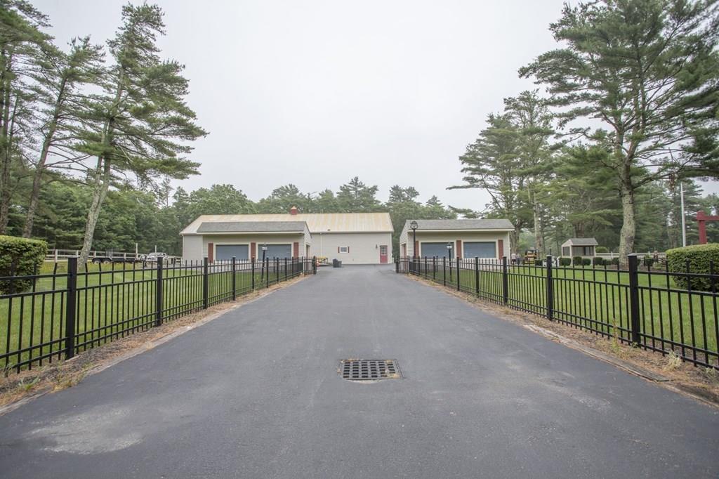 344 Walnut Plain Road Rochester, MA 02770 - Photo 2 of 42 a view of a deck and yard