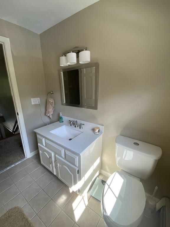 344 Walnut Plain Road Rochester, MA 02770 - Photo 23 of 42 a bathroom with a toilet sink and mirror