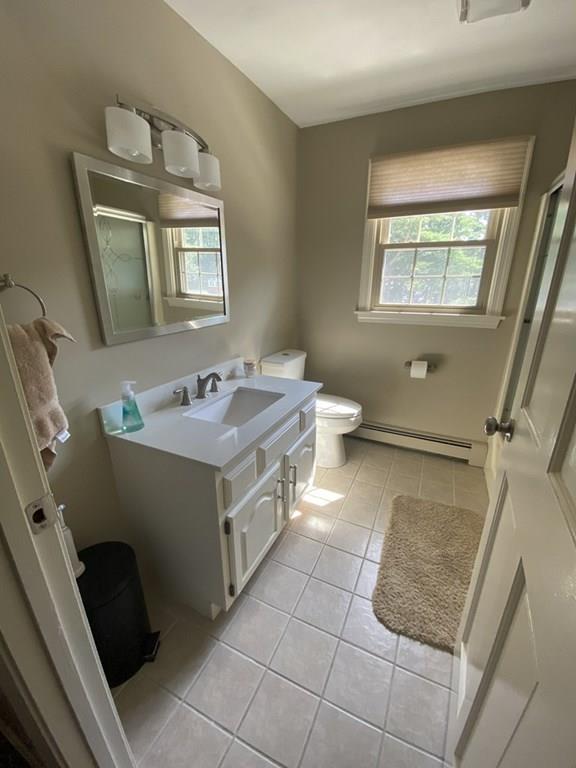 344 Walnut Plain Road Rochester, MA 02770 - Photo 24 of 42 a bathroom with a sink a toilet and mirror