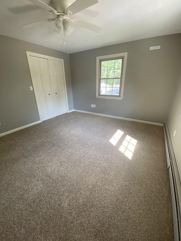 344 Walnut Plain Road Rochester, MA 02770 - Photo 26 of 42 an empty room with windows and closet area