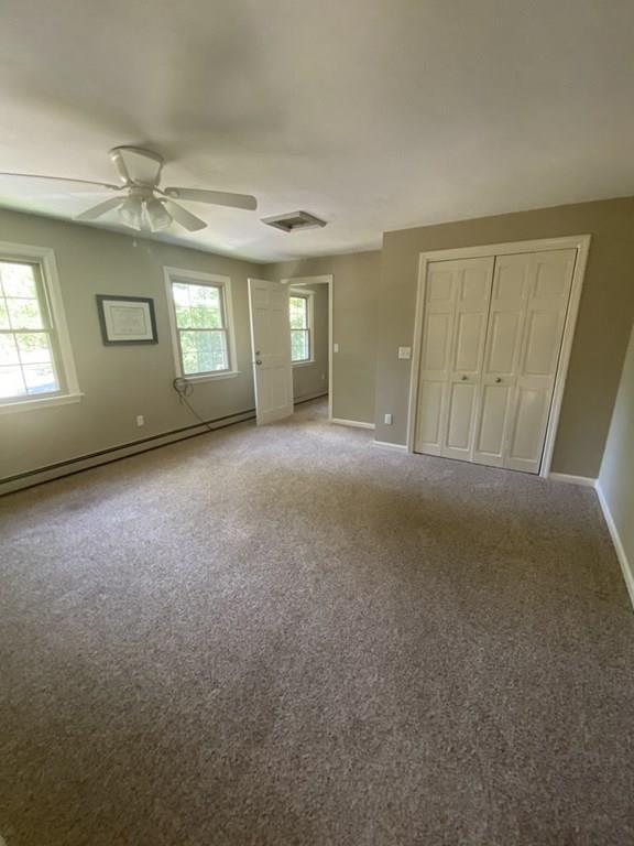 344 Walnut Plain Road Rochester, MA 02770 - Photo 29 of 42 an empty room with windows and closet