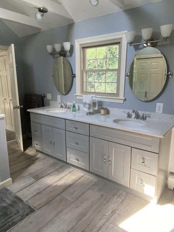 344 Walnut Plain Road Rochester, MA 02770 - Photo 32 of 42 a spacious bathroom with a double vanity sink mirror and