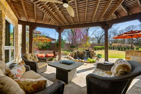 a outdoor living space with furniture and garden view
