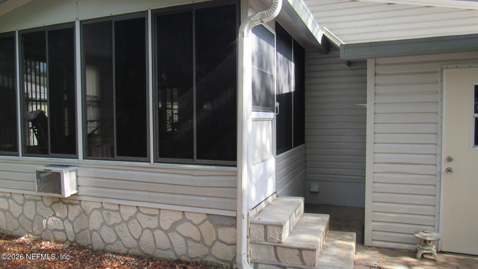2103 Stacey Drive Mount Dora, FL 32757 - Photo 13 of 44 Cobb - Stacey Drive - Exterior porch sta