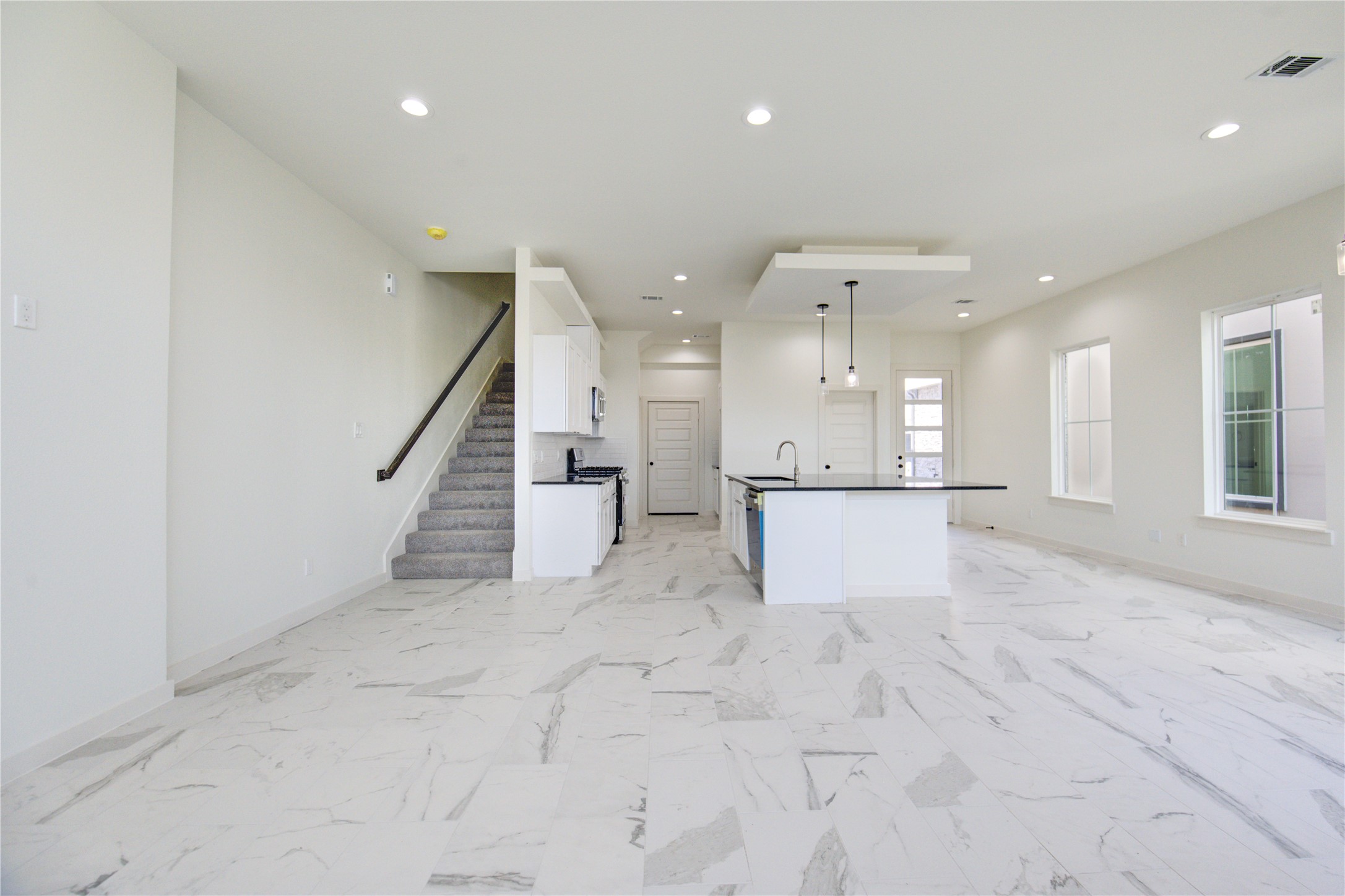 2912 El Fenice Lane Houston, TX 77057 - Photo 24 of 49 an empty room with wooden floor and windows