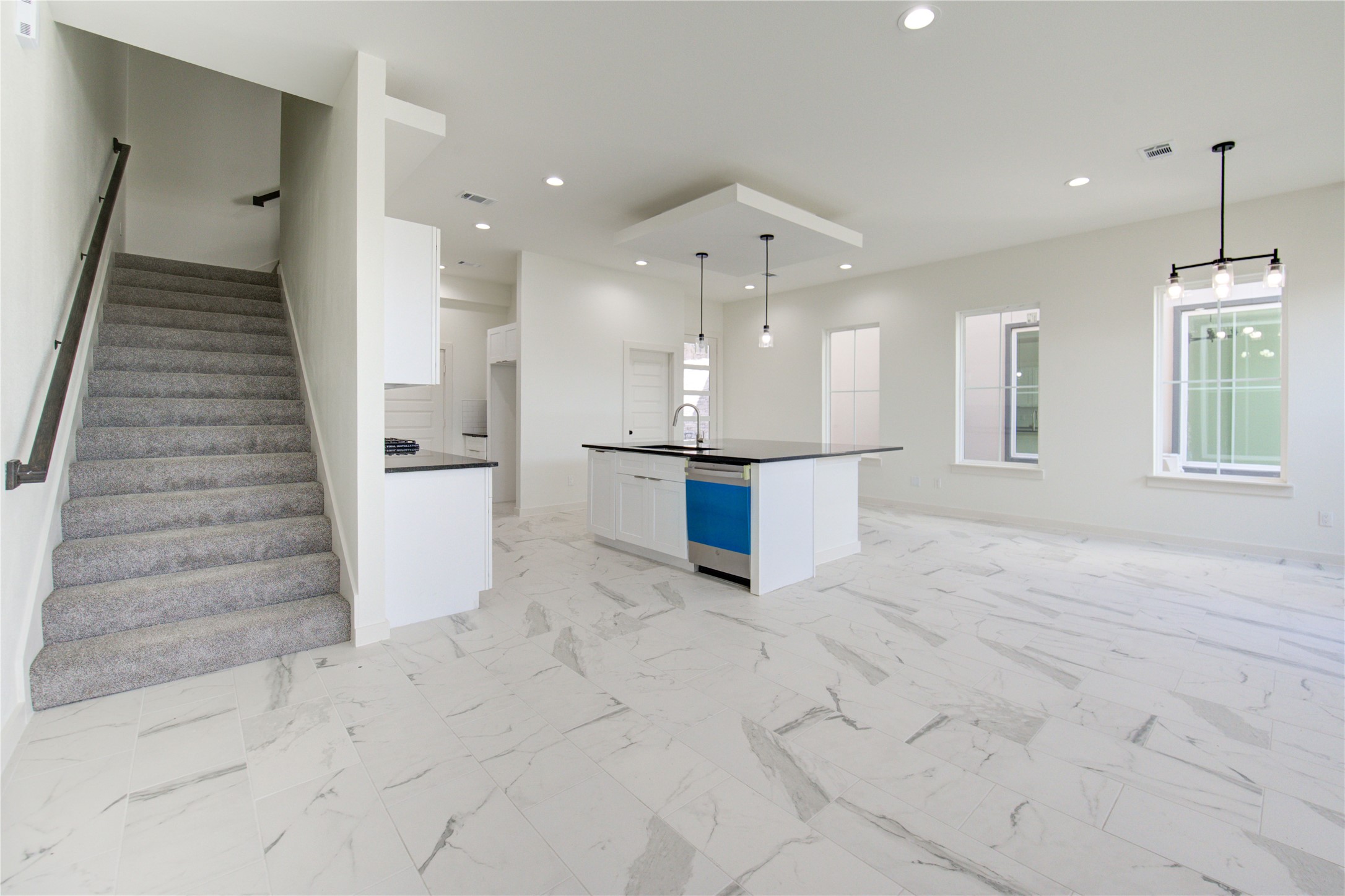2912 El Fenice Lane Houston, TX 77057 - Photo 42 of 49 a view of a hallway with wooden floor and staircase