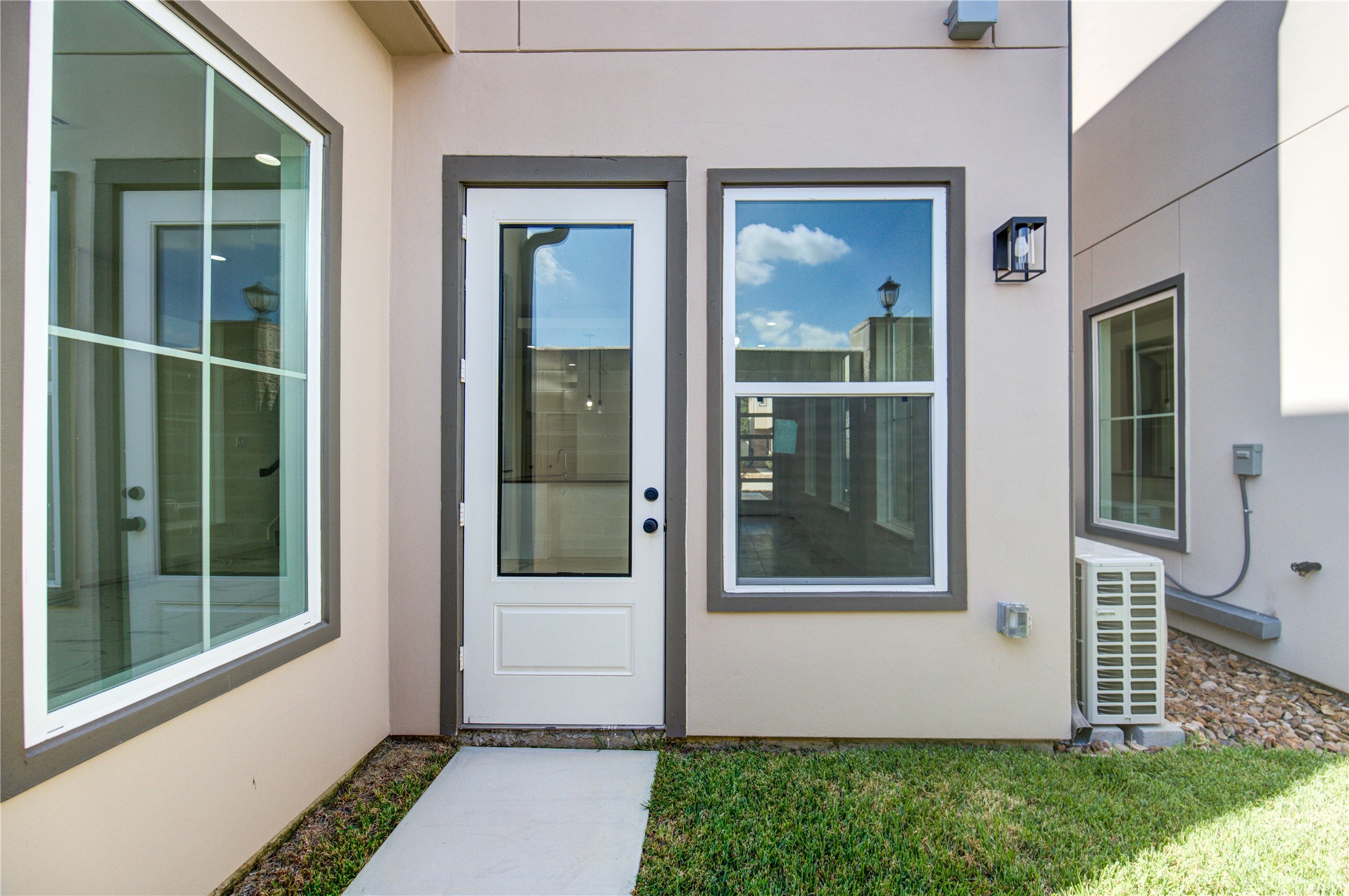 2912 El Fenice Lane Houston, TX 77057 - Photo 47 of 49 a front view of a house with a garden
