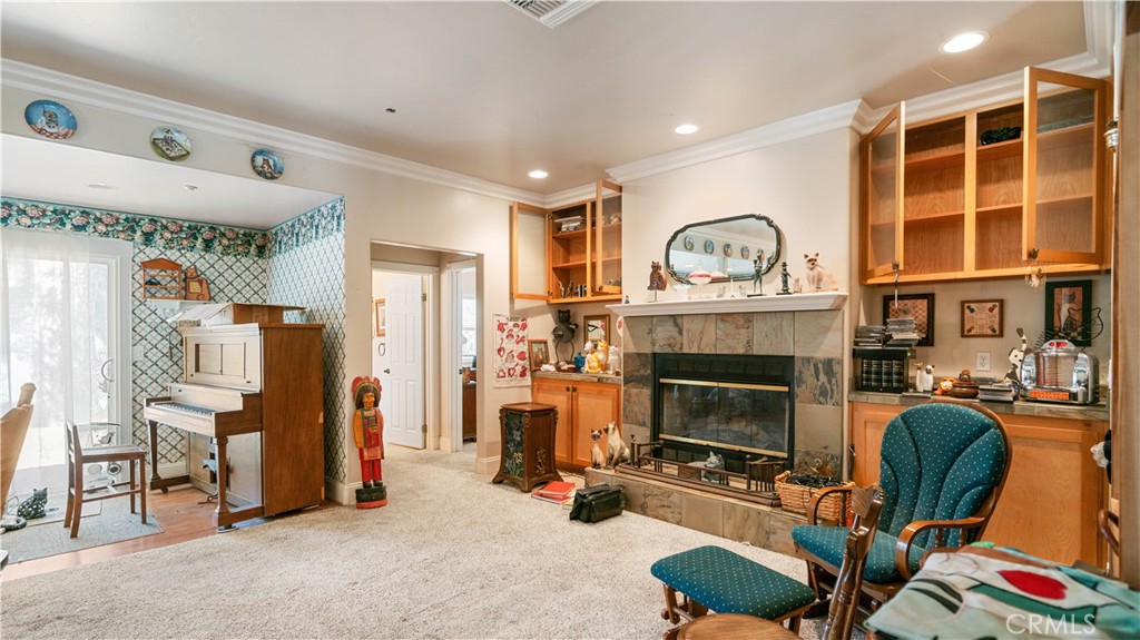 22070 Big Oak Road Cedarpines Park, CA 92322 - Photo 11 of 58 a living room with furniture and a fireplace