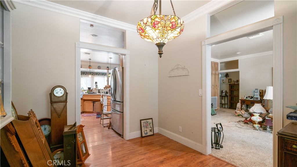 22070 Big Oak Road Cedarpines Park, CA 92322 - Photo 12 of 58 a view of a livingroom with a chandelier