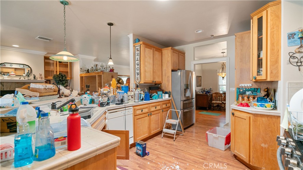 22070 Big Oak Road Cedarpines Park, CA 92322 - Photo 16 of 58 a kitchen with lots of counter top space