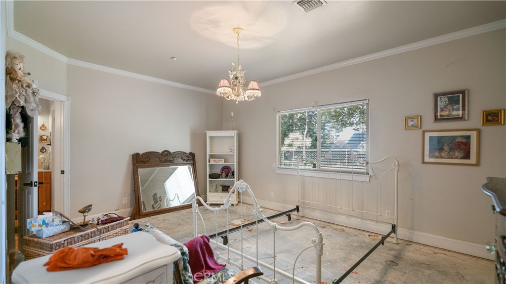 22070 Big Oak Road Cedarpines Park, CA 92322 - Photo 22 of 58 a room with furniture and window