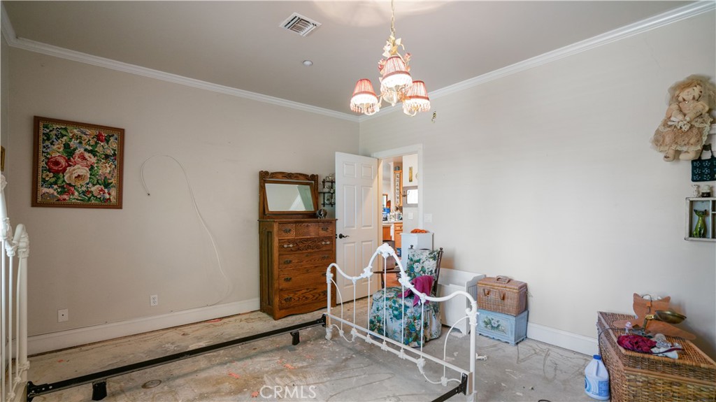 22070 Big Oak Road Cedarpines Park, CA 92322 - Photo 28 of 58 a view of a room with workspace and toys
