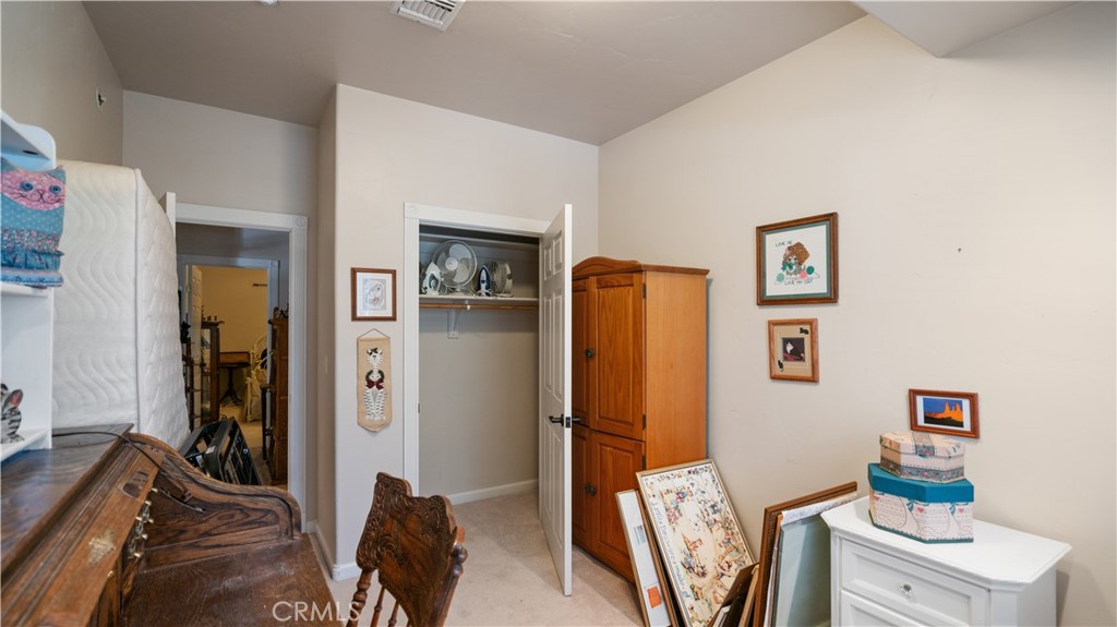 22070 Big Oak Road Cedarpines Park, CA 92322 - Photo 35 of 58 a bedroom with furniture and a bed