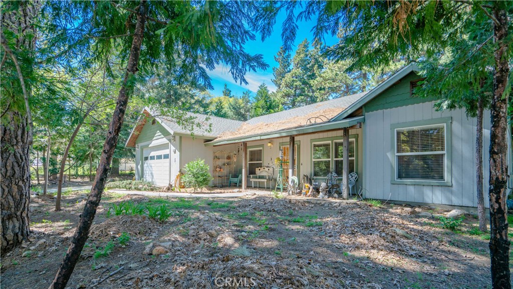 22070 Big Oak Road Cedarpines Park, CA 92322 - Photo 46 of 58 front view of a house with a yard