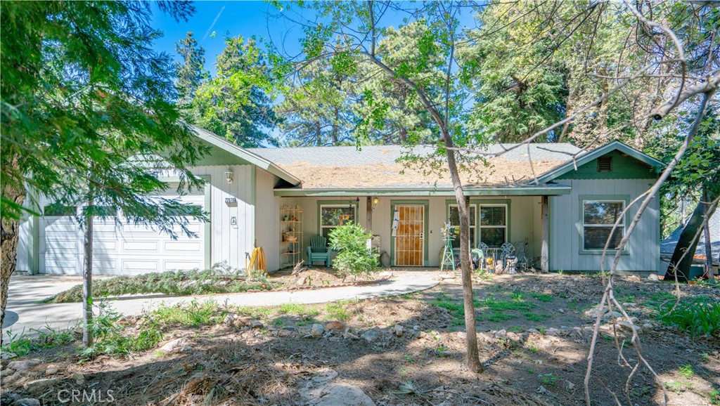 22070 Big Oak Road Cedarpines Park, CA 92322 - Photo 47 of 58 a front view of a house with a porch