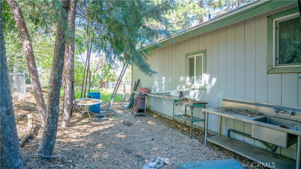 22070 Big Oak Road Cedarpines Park, CA 92322 - Photo 50 of 58 a view of a house with backyard and sitting area