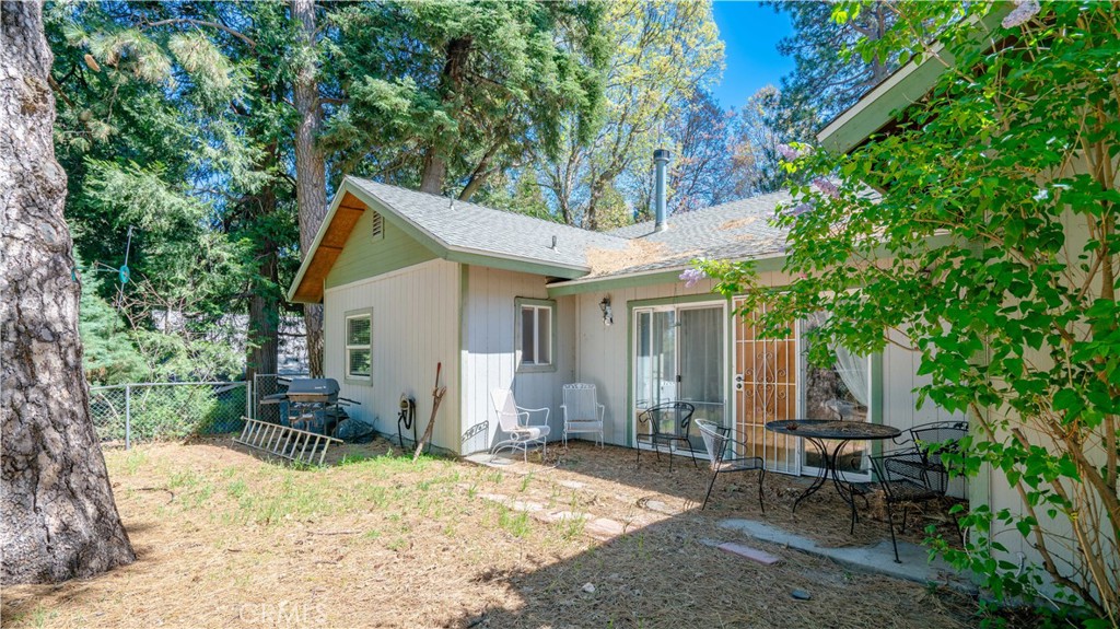 22070 Big Oak Road Cedarpines Park, CA 92322 - Photo 58 of 58 a view of a house with backyard and sitting area