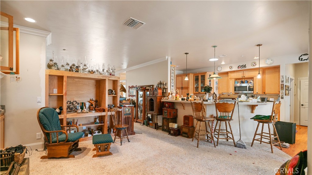 22070 Big Oak Road Cedarpines Park, CA 92322 - Photo 9 of 58 a view of a dining area with furniture