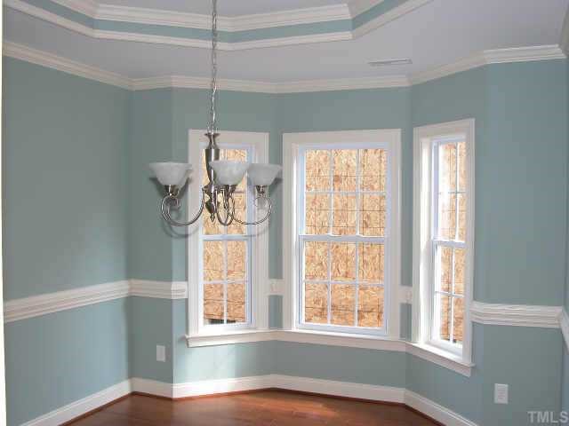 152 Sharp Top Trail Apex, NC 27502 - Photo 6 of 10 a view of a room with a large window and furniture