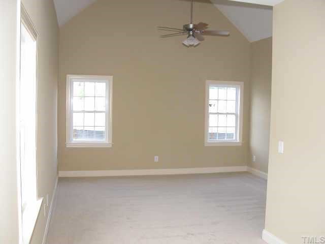 152 Sharp Top Trail Apex, NC 27502 - Photo 9 of 10 an empty room with a window and a fan