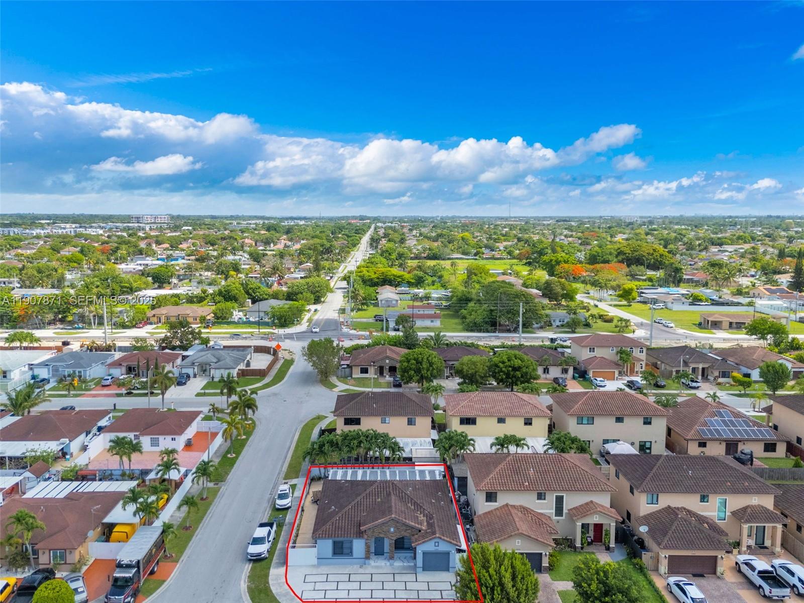 13381 Southwest 269th Street Homestead, FL 33032 - Photo 3 of 44 an aerial view of residential houses with outdoor space