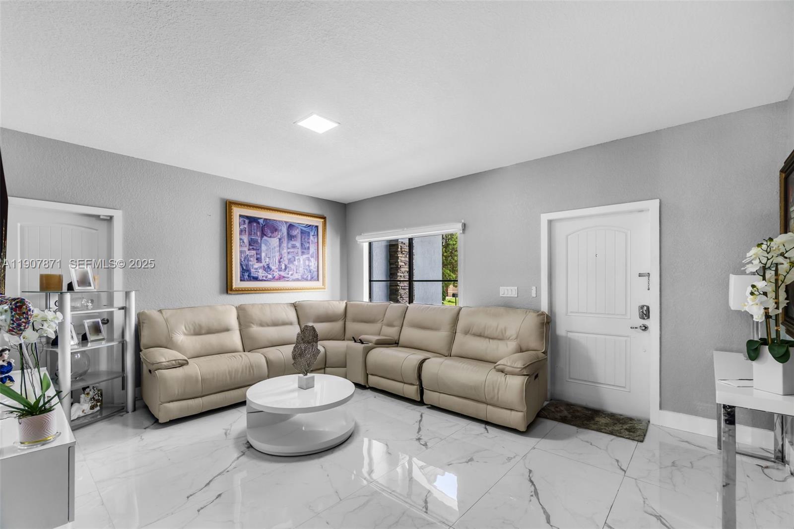 13381 Southwest 269th Street Homestead, FL 33032 - Photo 9 of 44 a living room with furniture and a couch