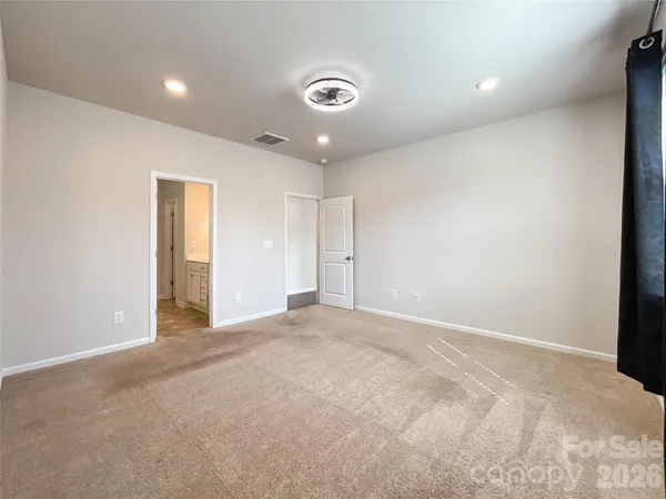 a bathroom with a sink double vanity and a mirror