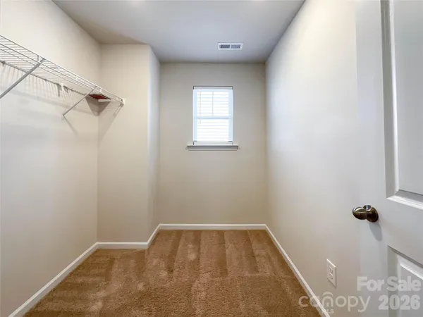 an empty room with an entryway